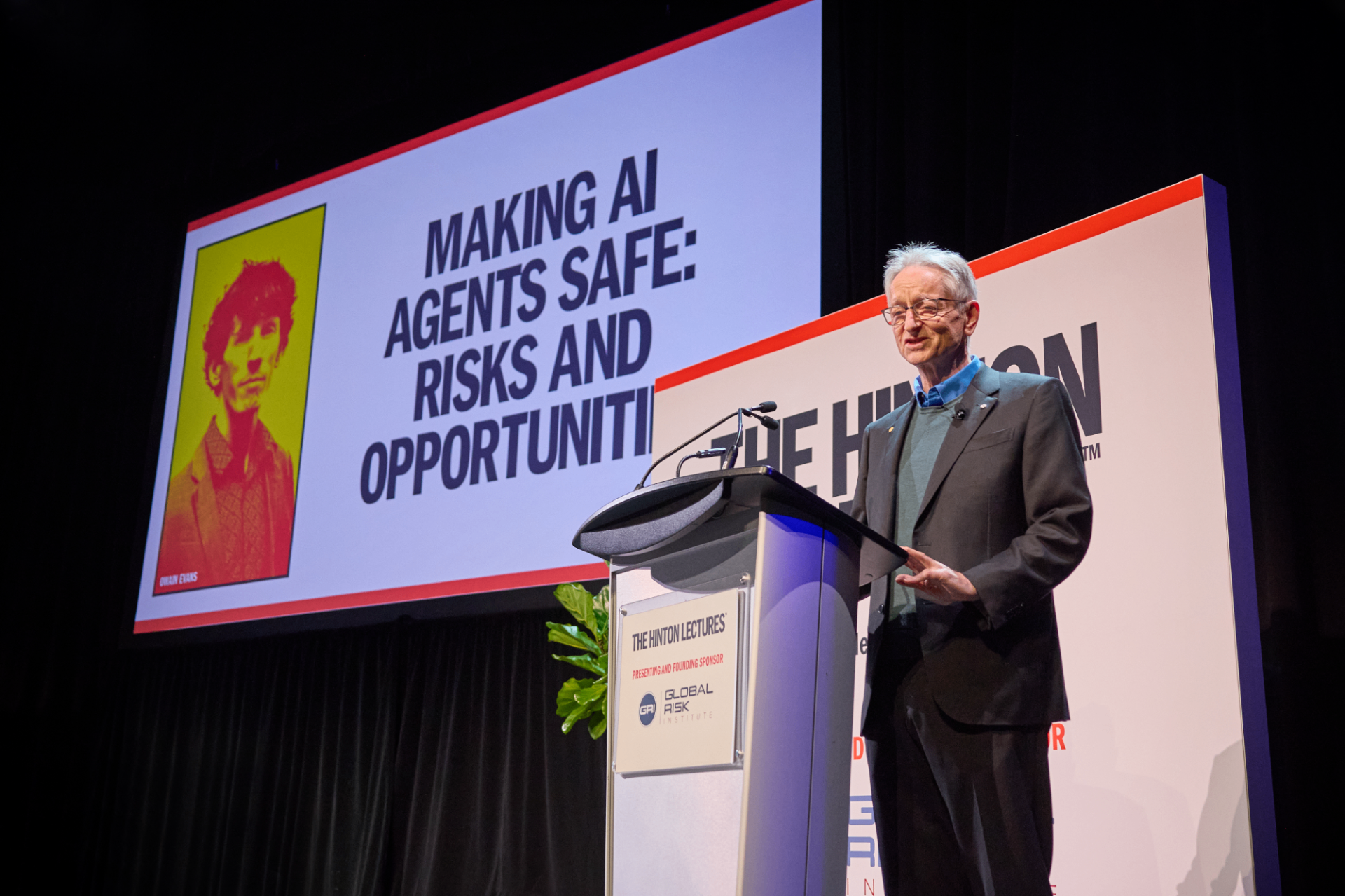 Geoffrey Hinton at the podium